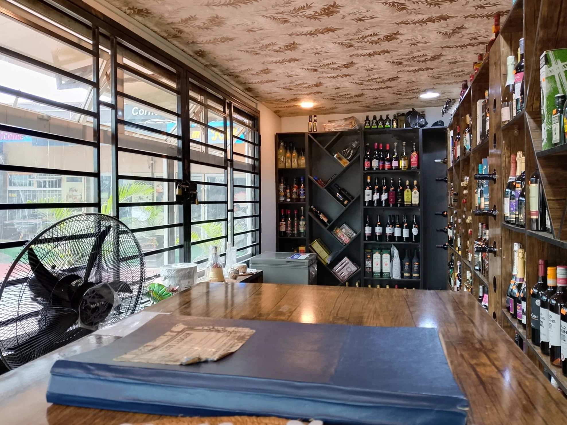 'Glasses & Bottles' Wine store at Zee & Dee Corner