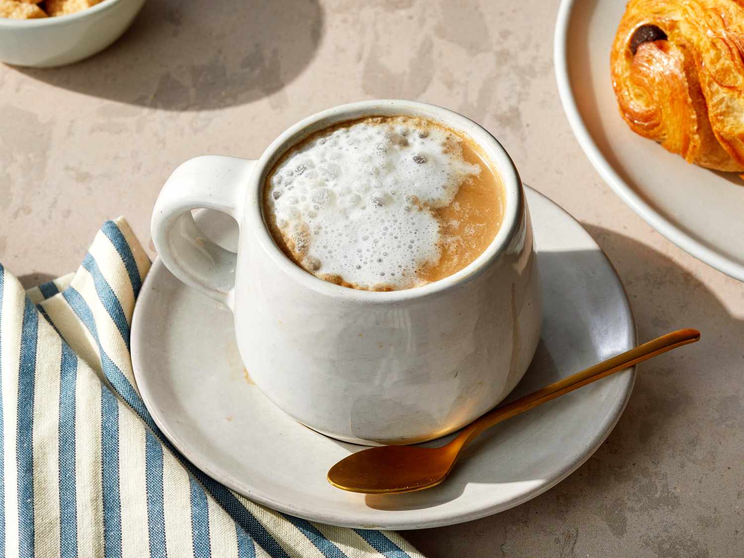 Latte served at Coffee & Co. Zee & Dee cafe in Karu, Abuja.